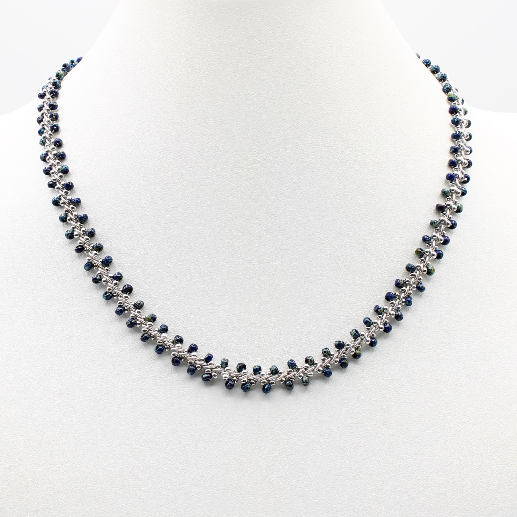 Dark Blue handmade beaded necklace on fine silver chain.